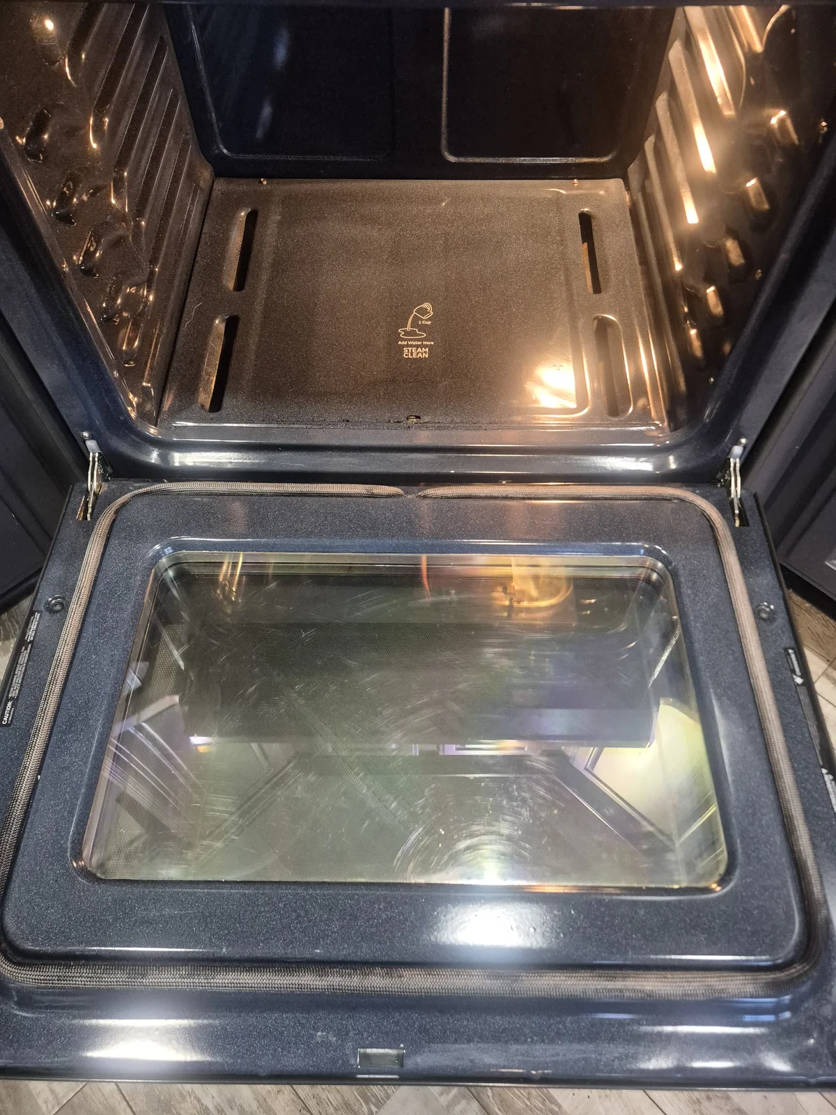 Deep cleaning a kitchen oven in an Edmond, OK home